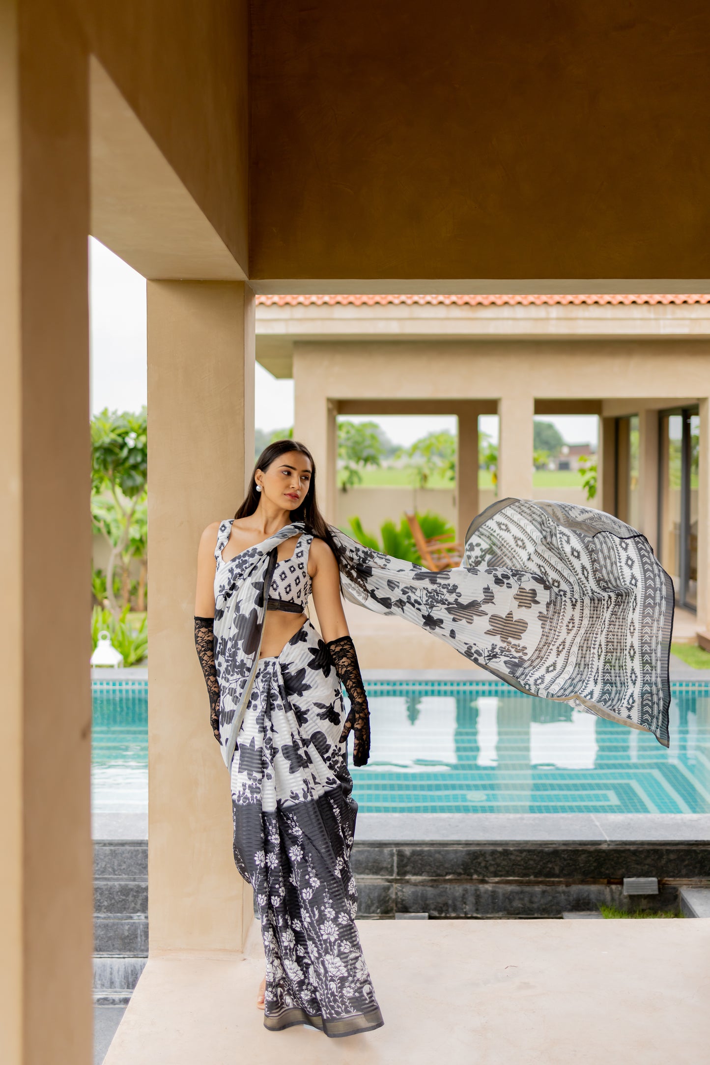 Elegant Black and White Floral Poly-Cotton Saree