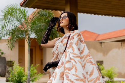 Elegant Cream and Brown Leaf Pattern Satin Georgette Saree