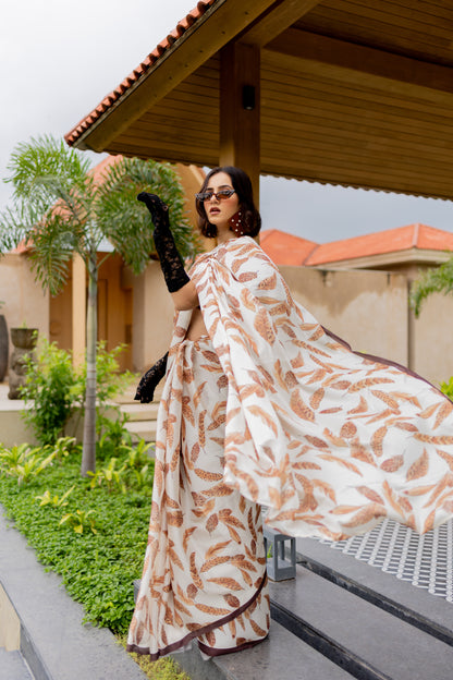 Elegant Cream and Brown Leaf Pattern Satin Georgette Saree