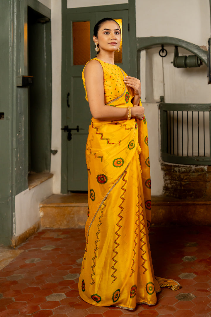 Vibrant Yellow Chiffon Saree with Traditional Motifs