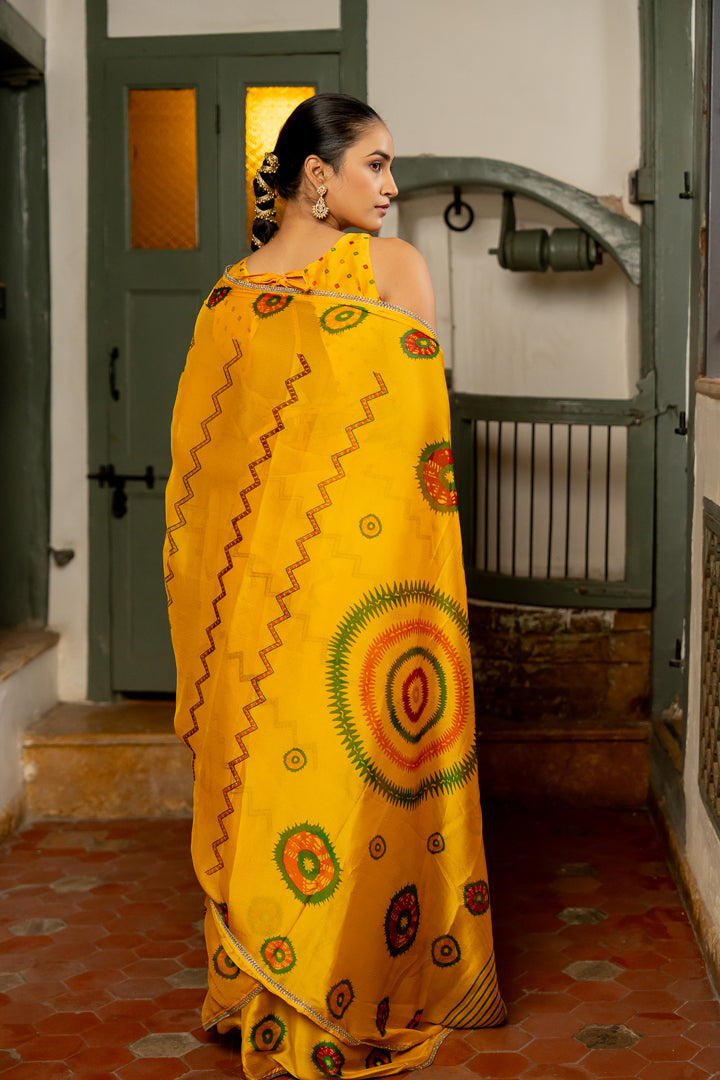 Vibrant Yellow Chiffon Saree with Traditional Motifs